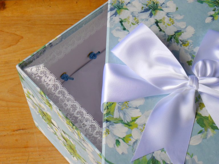 Memento Box in Orchard Blossom Sky showing lace trim finish on inside